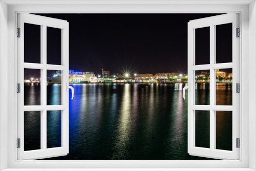 Fototapeta Naklejka Na Ścianę Okno 3D - Night view of port in Malaga, Spain on November 24, 2022