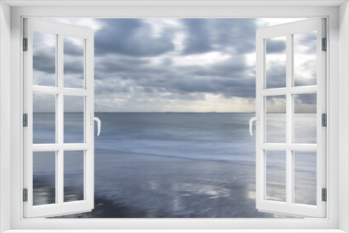 Fototapeta Naklejka Na Ścianę Okno 3D - Horizontal minimalistic view on the sea on a cloudy day. Abstract seascape background with soft blur and copy space