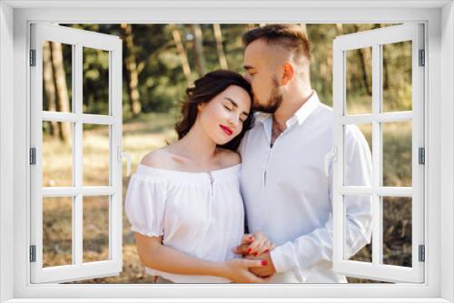 Young couple in love walking in the park