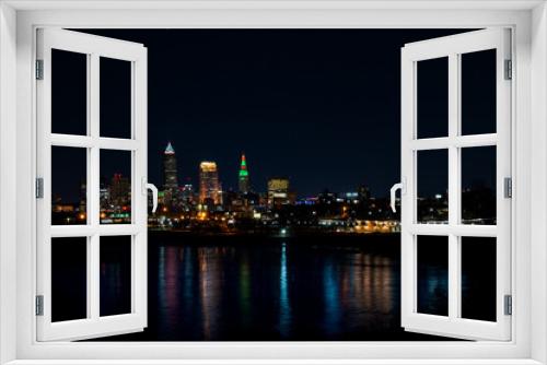 Fototapeta Naklejka Na Ścianę Okno 3D - Colorful Cleveland cityscape at nighttime.