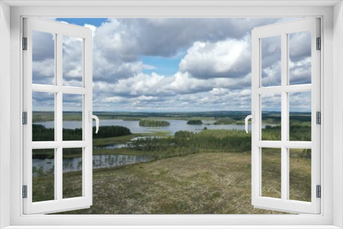 Fototapeta Naklejka Na Ścianę Okno 3D - survol des lacs suédois dans la région de Dalécarlie, Scandinavie