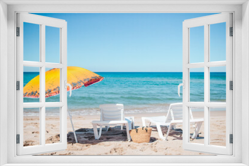 Fototapeta Naklejka Na Ścianę Okno 3D - Beach sun beds and umbrella on white beach