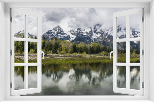 Fototapeta Naklejka Na Ścianę Okno 3D - Mountains reflecting in Grand Teton National Park