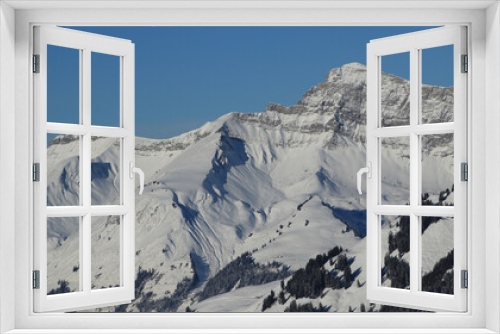 Fototapeta Naklejka Na Ścianę Okno 3D - Rock layers of Mount Vanil Noir in winter.