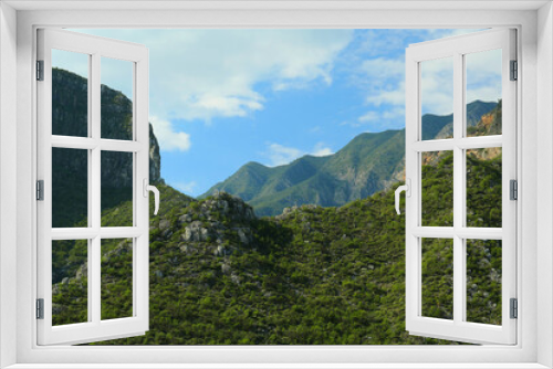 Fototapeta Naklejka Na Ścianę Okno 3D - Picturesque landscape with high mountains under blue sky outdoors