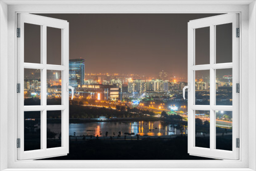 Fototapeta Naklejka Na Ścianę Okno 3D - HO CHI MINH, VIETNAM - November 11, 2022: Ho Chi Minh City at night, view to District 2, Thu Duc City, light trail, landmark 81