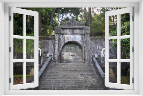 Fototapeta Naklejka Na Ścianę Okno 3D - massive entrance through the fortification wall into the gardens of the royal palace in Vietnam