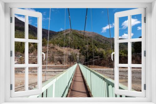 Fototapeta Naklejka Na Ścianę Okno 3D - 冬晴れの山梨県丹波山村の丹波川にかかるやまびこ橋