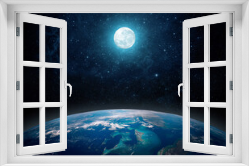 Fototapeta Naklejka Na Ścianę Okno 3D - A full moon above the planet Earth. View from space to the starry sky full moon and the planet Earth. Elements of this image furnished by NASA.