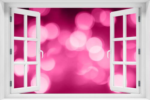 Web banner, abstract background of blurred viva magenta lights for design. Lights bokeh dis focus. Christmas background, copy space