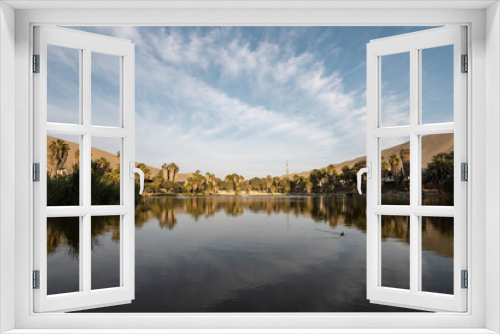 Fototapeta Naklejka Na Ścianę Okno 3D - landscape details of a lake surrounded by nature, tourist destination at day, environment wallpaper in natural condition, horizon