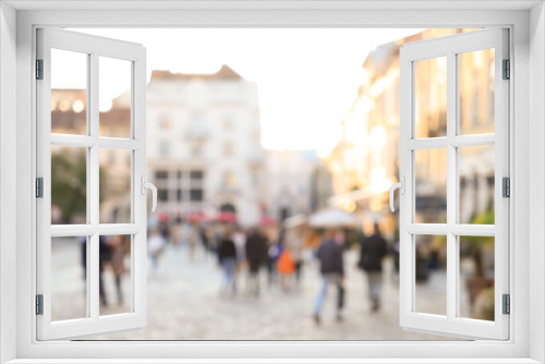 Fototapeta Naklejka Na Ścianę Okno 3D - Blurred view of people walking on city street