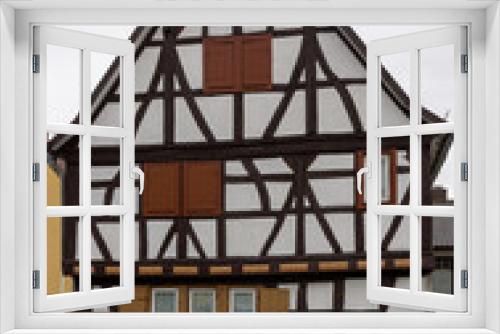 Fototapeta Naklejka Na Ścianę Okno 3D - old, half-timbered house in Weiterstadt, Hesse, in cloudy autumn weather