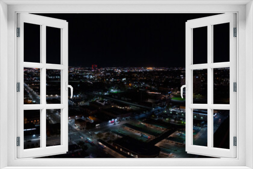 Fototapeta Naklejka Na Ścianę Okno 3D - Aerial view of the skyline of Reno Nevada USA at night. City lights, night streets and casinos in Reno, USA.