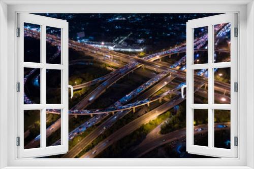 Fototapeta Naklejka Na Ścianę Okno 3D - Aerial view of car traffic transportation above circle road of Drone aerial view fly , high angle. Public transport or commuter city life concept of economic and energy, infrastructure	