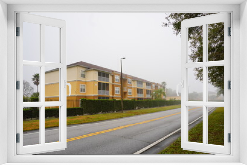 Fototapeta Naklejka Na Ścianę Okno 3D - The morning fog landscape in Florida community