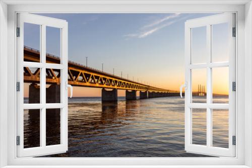 Fototapeta Naklejka Na Ścianę Okno 3D - The Oresund Bridge at sunset. A bridge over to Denmark