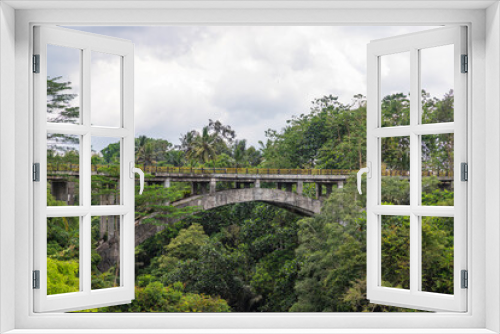 Fototapeta Naklejka Na Ścianę Okno 3D - Titi Gantung bridge in jungle. Bali, Indonesia
