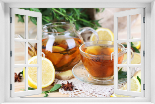 Fototapeta Naklejka Na Ścianę Okno 3D - Kettle and cup of tea with ginger