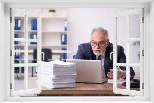 Old male employee and too much work in the office