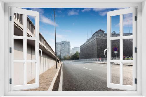 Fototapeta Naklejka Na Ścianę Okno 3D - a road in city