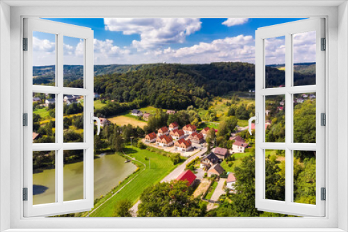Fototapeta Naklejka Na Ścianę Okno 3D - osiedle w dolinie