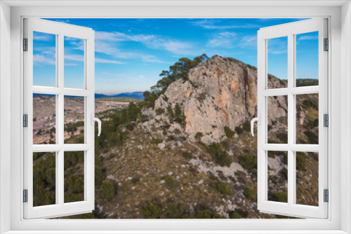 Fototapeta Naklejka Na Ścianę Okno 3D - Mountain nexts to Pinoso aerial view by drone Alicante, Spain