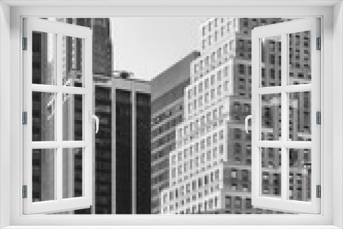 Fototapeta Naklejka Na Ścianę Okno 3D - Black and white photo of Manhattan diverse architecture, New York City, USA.