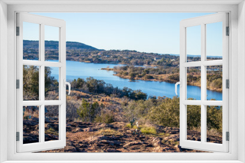 Fototapeta Naklejka Na Ścianę Okno 3D - Texas Hill Country lake views from the top of a hill on a trail located in Inks Lake State Park, Burnet Texas.  Texas State Parks Celebrating 100 years.