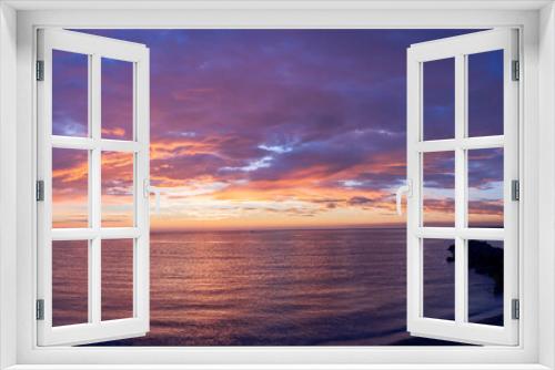 Fototapeta Naklejka Na Ścianę Okno 3D - view at sunrise or sunset in sea with nice beach , surf , calm water and beautiful clouds on a background of a sea landscape
