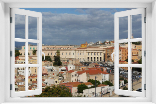 Fototapeta Naklejka Na Ścianę Okno 3D - Wide angle overview of the city of Cagliari, Sardinia, in evening sunshine