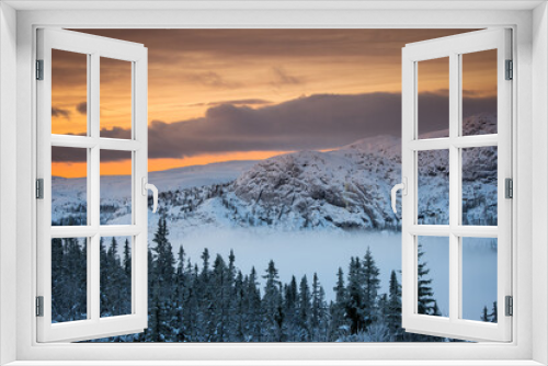 Fototapeta Naklejka Na Ścianę Okno 3D - Mountain peak during sunrise . Natural landscape in the Norway at winter time.