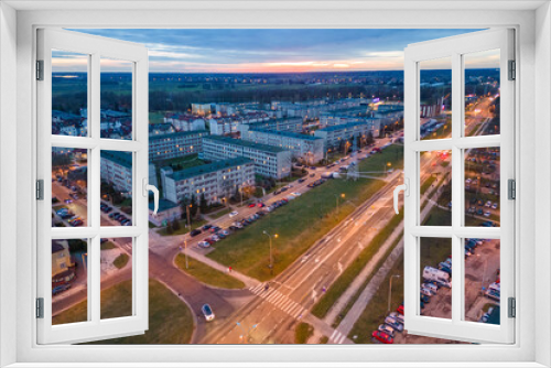 Fototapeta Naklejka Na Ścianę Okno 3D - View at Pabianice city from a drone at sunset