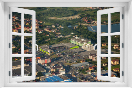 Fototapeta Naklejka Na Ścianę Okno 3D - The city of Bistrita seen from the plane in August 2020 Bistrita, Romania,