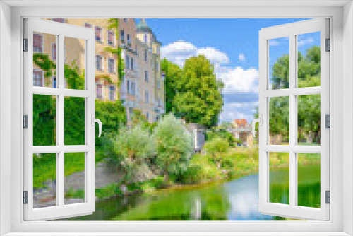 Fototapeta Naklejka Na Ścianę Okno 3D - view of the river and houses in the city of Laaber, Germany 