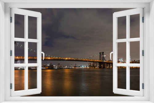 Fototapeta Naklejka Na Ścianę Okno 3D - View of the Brooklyn, Manhattan and Williamsburg Bridge at night. Long Exposure Photo Shoot.