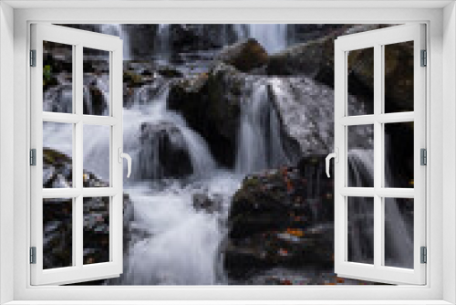Fototapeta Naklejka Na Ścianę Okno 3D - Long exposure of a waterfall in the forest in autum