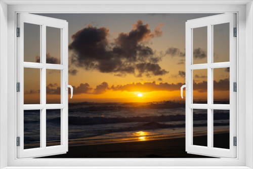 Fototapeta Naklejka Na Ścianę Okno 3D - Sunset on the beach. Paradise beach. Tropical paradise, clear water. Seascape in early evening, sunrise over the ocean. Nature landscape. Orange and golden sunset sky. 