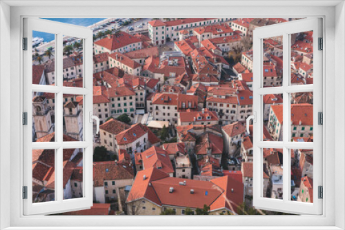 Fototapeta Naklejka Na Ścianę Okno 3D - Kotor, Montenegro, beautiful top panoramic view of Kotor city old medieval town seen from San Giovanni St. John Fortress, with Adriatic sea, bay of Kotor and Dinaric Alps mountains in a sunny day