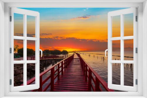 Fototapeta Naklejka Na Ścianę Okno 3D - Sea coast and wooden bridge,View of wooden bridges and coastline at sunrise,Wooden bridge at the sea at sunset