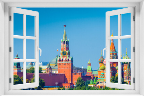 Fototapeta Naklejka Na Ścianę Okno 3D - Spasskaya Tower of Moscow Kremlin and Cathedral of Vasily the Blessed (Saint Basil's Cathedral) on Red Square in summer sunny day.  Panorama. Moscow. Russia