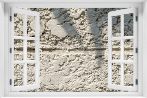 Fototapeta Naklejka Na Ścianę Okno 3D - white exterior cement wall rough surface The morning sun and the shadow of the leaves Uneven texture and background with shadows of plants.