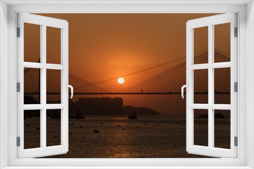 Fototapeta Naklejka Na Ścianę Okno 3D - Sunset on suspension bridge in Hong Kong city