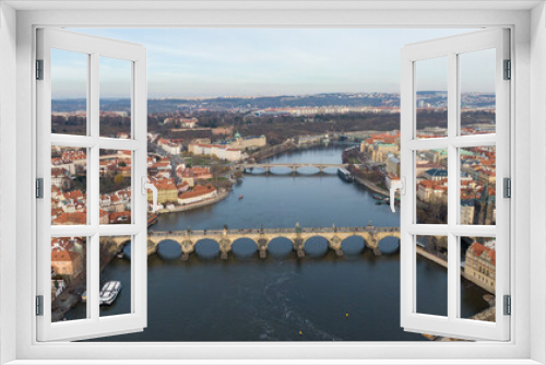 Fototapeta Naklejka Na Ścianę Okno 3D - Aerial view of River and buildings in Old Town of Prague, Czech Republic. Drone photo high angle view of City