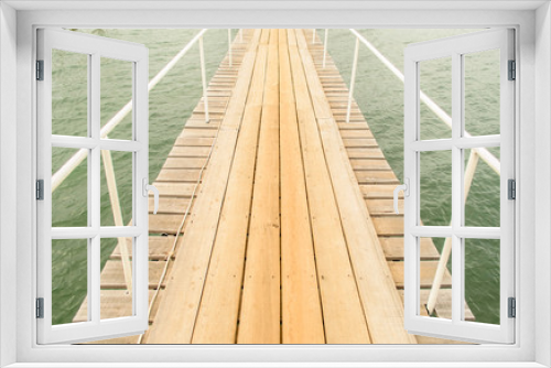 Fototapeta Naklejka Na Ścianę Okno 3D - Wood Bridge on the Sea
