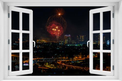 Fototapeta Naklejka Na Ścianę Okno 3D - The blurred background of fireworks (light trails) is beautiful at night, seen in the New Year holidays, Christmas events, for tourists to take pictures during public travel.