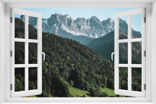 Fototapeta Naklejka Na Ścianę Okno 3D - Majestic mountains in the Alps covered with trees and clouds