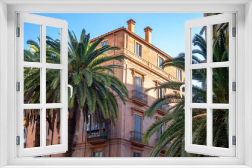 Fototapeta Naklejka Na Ścianę Okno 3D - Decorated exteriours residental buildings in Malaga city, Andalusia, Spain with palm trees
