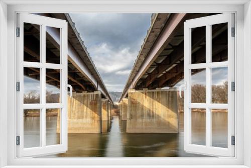 Fototapeta Naklejka Na Ścianę Okno 3D - View from under I84 highway over the Delaware River at Matamoris, PA