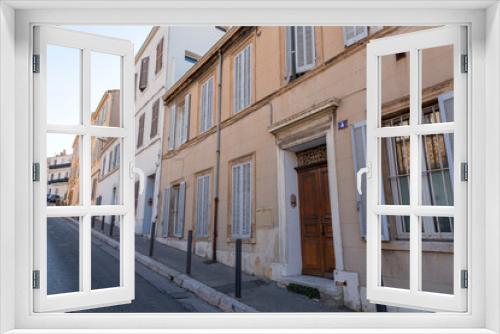 Fototapeta Naklejka Na Ścianę Okno 3D - Marseille, France - FEB 28, 2022: Street view from the central areas of Marseille